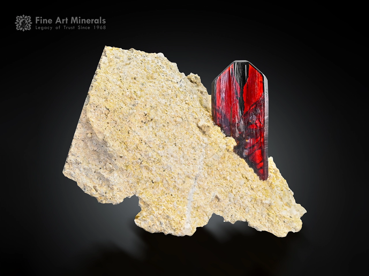 Phantom brookite with fiery red titanium crystal dp Fiery red phantom brookite crystal with sharp termination on an earthy tone matrix.