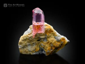 Pink topaz crystal growing on a natural matrix from Katlang, Pakistan