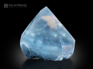 Quartz crystal with vivid blue dumortierite inclusions from Brazil.
