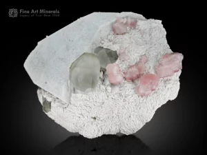 Morganite crystals with topaz, quartz, and albite on white matrix from Shengus Roundu District, Gilgit Baltistan, Pakistan.