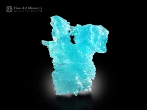 Etched aquamarine crystal from Pedra Azul, Brazil, with intense blue color and sculptural natural form.