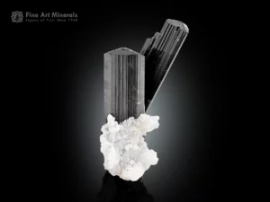 Schorl tourmaline crystal cluster with cleavelandite from Pakistan.