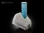 Sky blue aquamarine crystal with smaller crystals on matrix from Pakistan.