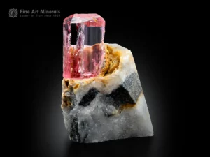 Transparent pink topaz crystal with rich color on natural matrix from Katlang, Pakistan.