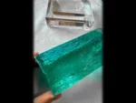 Glassy gemmy aquamarine crystal with etched surfaces and sea green blue color from Medina Mine, Brazil.