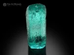 Glassy gemmy aquamarine crystal with etched surfaces and sea green blue color from Medina Mine, Brazil.