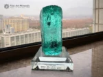Glassy gemmy aquamarine crystal with etched surfaces and sea green blue color from Medina Mine, Brazil.