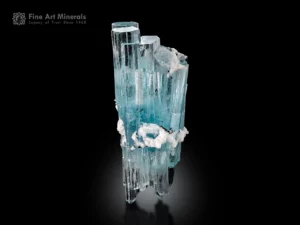 Gem-quality aquamarine crystal cluster with albite and schorl mineral specimen.