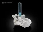 Gem-quality aquamarine crystal with hexagonal termination on sparkling quartz and albite matrix.