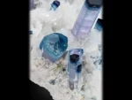 Blue lilac tourmaline crystal cluster on cleavelandite matrix, repaired specimen.
