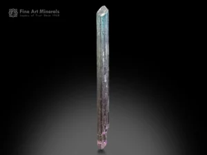 Spodumene var. Kunzite crystal with lilac color gradient and vertical striations.