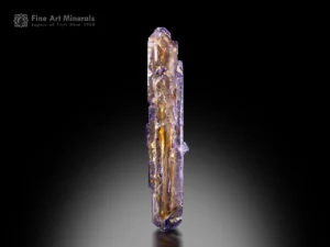 Floater fluorite crystal with honey gold, peach, and lilac tones from Linxi County, Inner Mongolia, China.