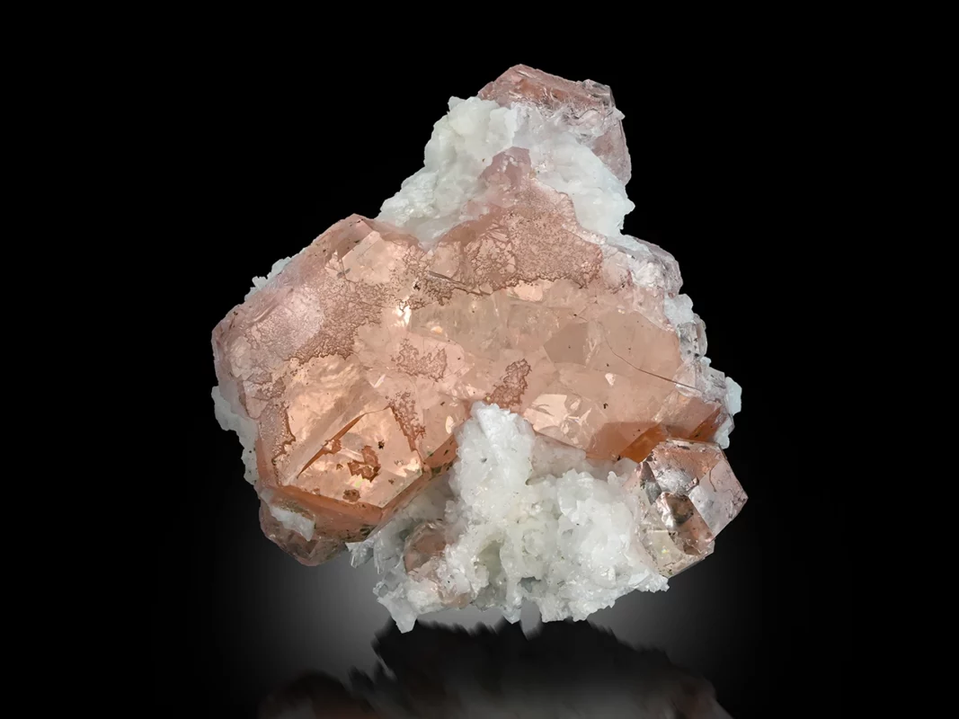 Gemmy fluorite crystal with fine shape and luster on white albite matrix from Pakistan.