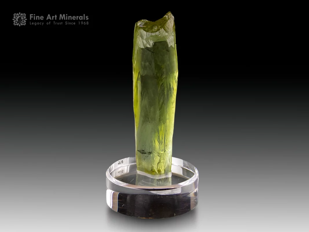 Heliodor crystal from Brazil with bright yellow color, glassy luster, and sharp termination.