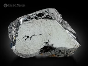 Hematite crystal with strong metallic luster and geometric etched faces.