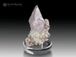 Lavender purple calcite crystal on white matrix from Tonglushan mine, China.
