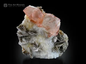 Fluorite crystals with a green hue on albite and muscovite matrix from Chumar Bakhoor, Pakistan.