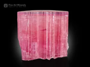 Pink tourmaline crystal with strong vertical striations and flat termination. t