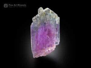 Purple kunzite crystal with vertical striations and natural termination from Afghanistan.