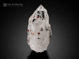 Quartz crystal with spessartine inclusions and sharp termination.
