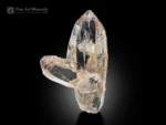 Clear quartz crystal with sharp termination and siderite association from Pakistan.