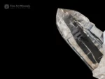 Clear quartz crystal with sharp termination and siderite association from Pakistan.