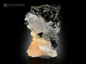 Quartz with epidote specimen showing a clear crystal and a dark green contrast in the cluster growth.