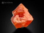 Scheelite crystal with vibrant orange color and interlocking crystal habit from Gilgit Baltistan, Pakistan.