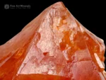 Scheelite crystal with vibrant orange color and interlocking crystal habit from Gilgit Baltistan, Pakistan.