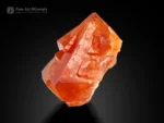 Scheelite crystal with vibrant orange color and interlocking crystal habit from Gilgit Baltistan, Pakistan.