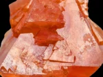 Scheelite crystal with vibrant orange color and interlocking crystal habit from Gilgit Baltistan, Pakistan.