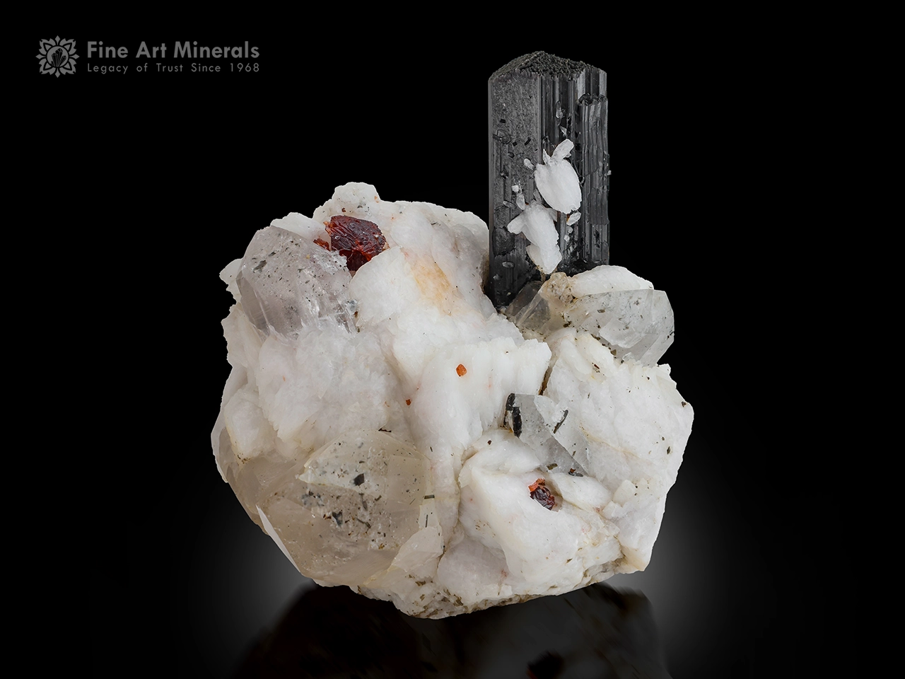 Schorl crystal with spessartine garnet, quartz, and albite matrix