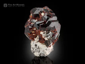 Spessartine garnet cluster with muscovite and albite mineral specimen.