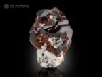 Spessartine garnet cluster with muscovite and albite mineral specimen.