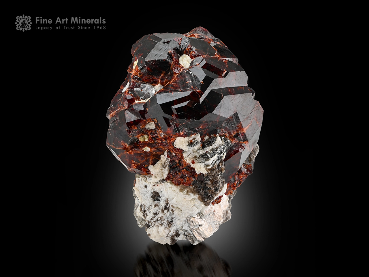 Spessartine garnet cluster with muscovite and albite mineral specimen.