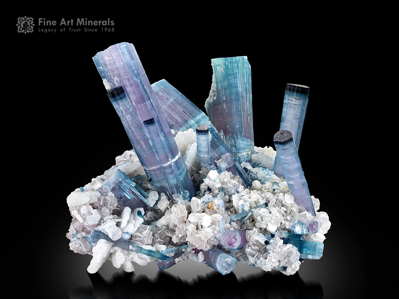 Blue tourmaline cluster on albite quartz lepidolite matrix, repaired specimen