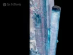 Tourmaline crystal with pink and blue-green color zoning and side crystals.