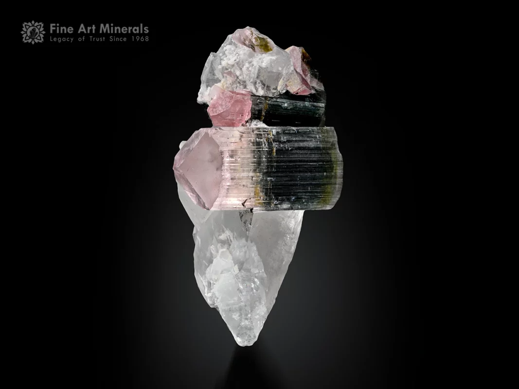 Tourmaline crystal with pink and green zoning on quartz from Stak Nala Haramosh Mountains, Pakistan.