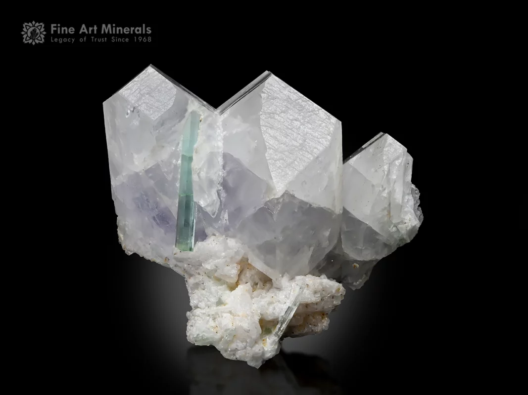 Viitaniemiite crystal with twinning on albite matrix with tourmaline association.