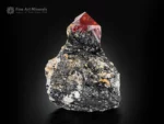 zircon crystal on matrix, rich red color, sharp geometry, glassy luster, specimen
