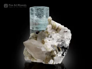 Sky-blue aquamarine crystal on matrix with quartz, albite, muscovite, and black schorl inclusions