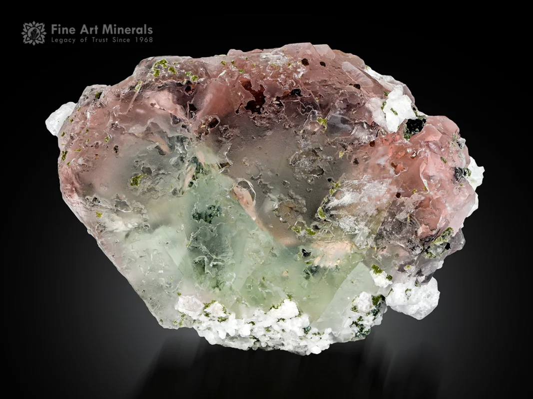 Bi-color Fluorite crystal with white Albite and green Tourmaline association.