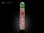 9 cm elongated bi-color tourmaline crystal with pink and green color zoning, doubly terminated, from Paprok Valley, Afghanistan.