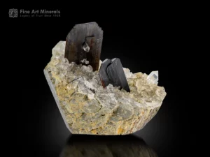 Brookite crystals on sparkling quartz matrix showing sharp form and natural contrast.
