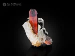 Fiery red brookite crystals with phantom on glittering quartz matrix from Pakistan.