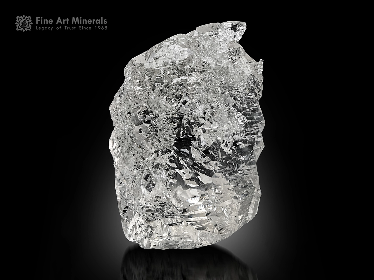 Etched quartz crystal with intricate natural etching and reflective surfaces