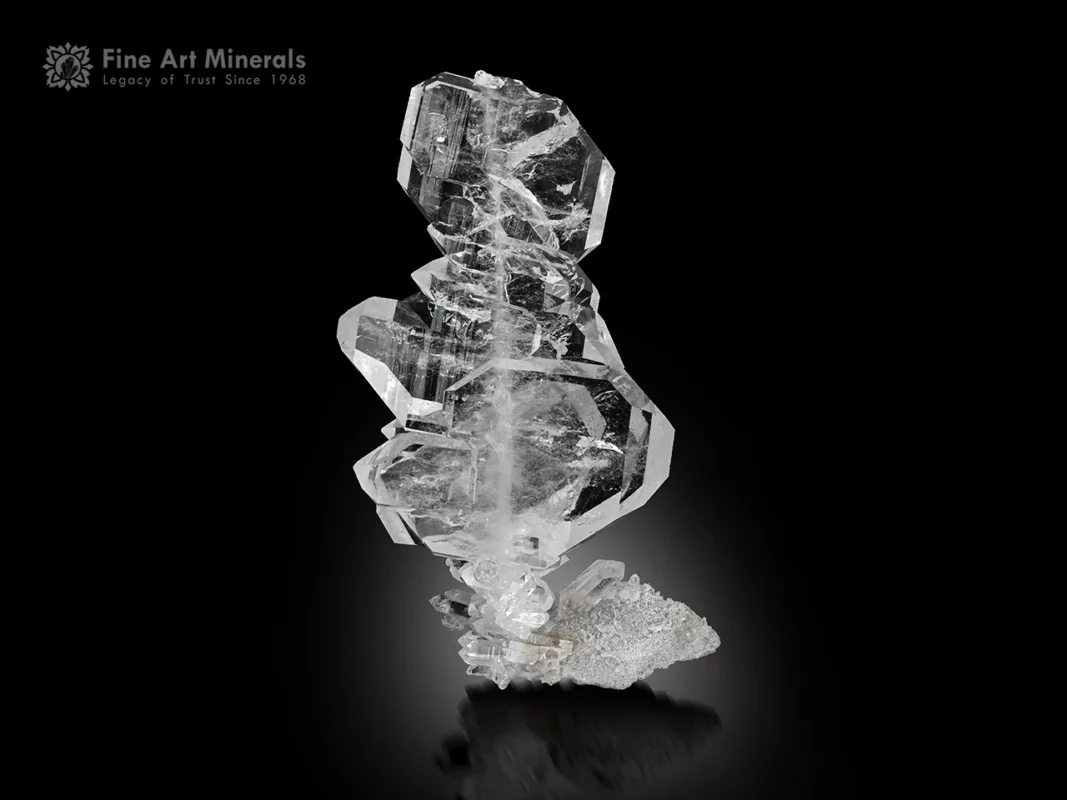 Glassy Faden Quartz crystal with visible thread inclusion on the matrix.