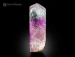 Kunzite crystal from Afghanistan with lilac color, natural colorless zones, and superb luster displayed against a black background