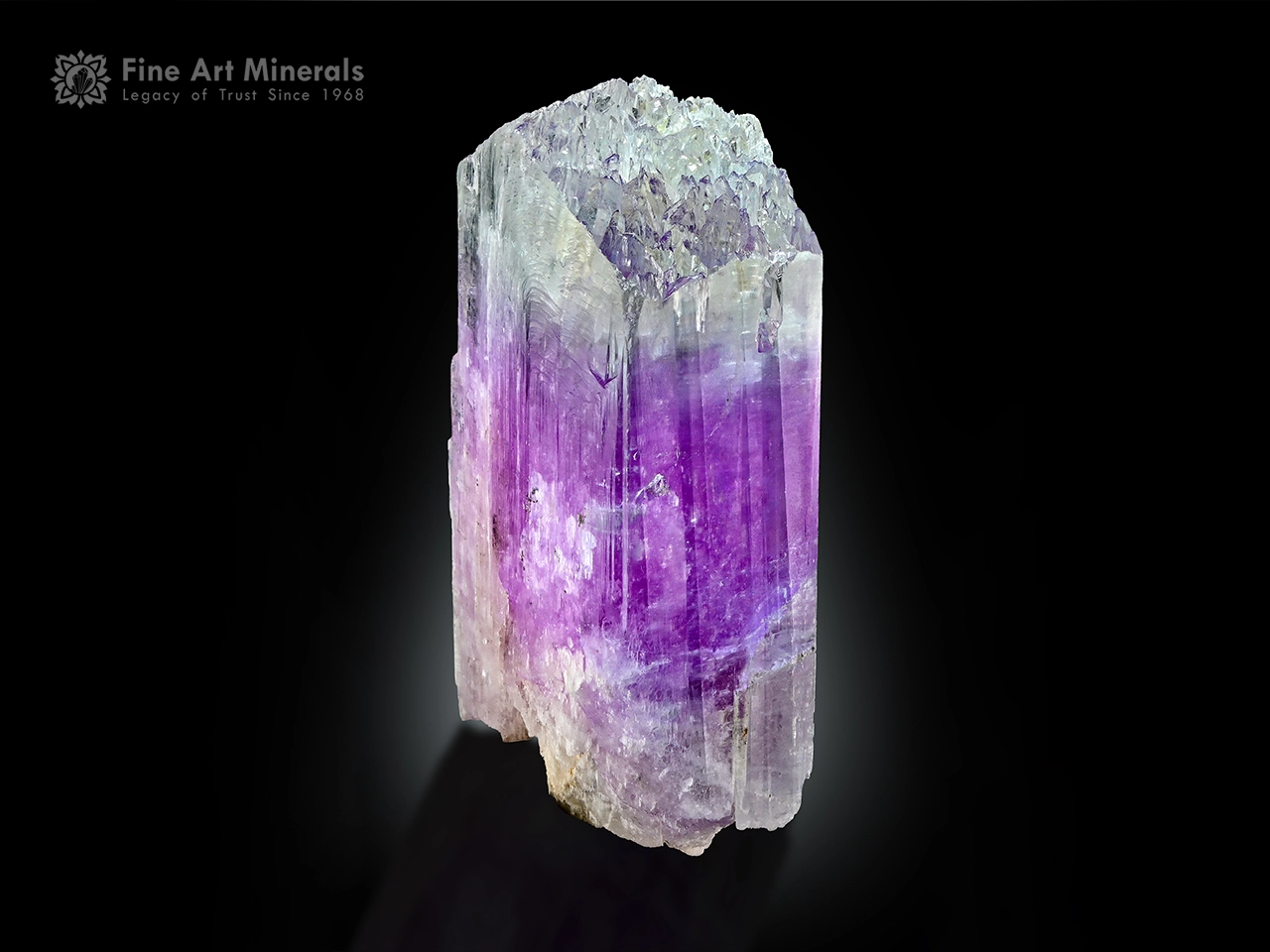 Kunzite crystal Afghanistan (1) Kunzite crystal from Afghanistan showing lilac color with clear zones, good clarity, and vertical striations
