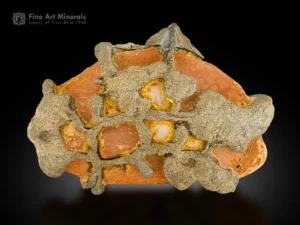Metallic Pyrite formations on earthy orange Limonite matrix from Pakistan